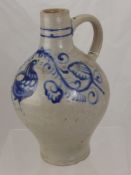 An Antique German Westerwald Style Stone Ware Cider Flagon with blue hand painted decoration