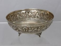 A Silver Bowl, with intricate vine carving with three feet, stamped 830 mm KM, approx