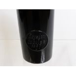 A 19th Century Black Glass Sealed Wine Bottle, the seal stamped Rousdon Jubilee and dated 1887.