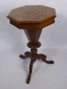 A Octagonal Walnut Veneer Sewing Table, decorative inlay and contents, carving to turned supports