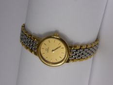 A Lady's Omega de Ville Stainless Steel and Gold Plated Bracelet Watch, the watch having concealed