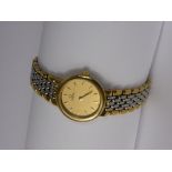 A Lady's Omega de Ville Stainless Steel and Gold Plated Bracelet Watch, the watch having concealed