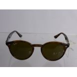 A Pair of Tortoiseshell Wayfarer Sunglasses, model nr 2810, uncased.