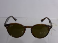 A Pair of Tortoiseshell Wayfarer Sunglasses, model nr 2810, uncased.