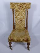 An Antique Mahogany Prayer Chair, together with an Edwardian Mahogany Inlaid Dining Chair. (2)