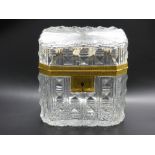 An Antique French Cut Crystal and Ormulu Sugar Caddy, with star burst design to base and lid, approx