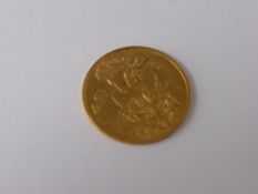 A Gold Half Sovereign, dated 1910.