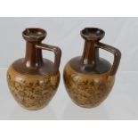 A Pair of Doulton Stone Ware Miniature Jugs, two tone brown with foliate design. (2)