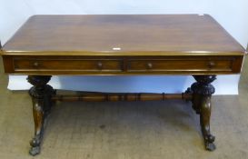 A Mid Victorian Walnut Library Table, approx 135 x 75 x 73 cms two drawers, supported on ornately