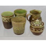 Sidney Tustin, Winchombe Pottery Three Green Glaze Beakers sugar bowl and cover, soup dish and a