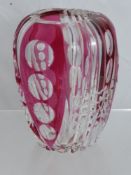 A Signed Cut Glass Vase, the vase having ruby overlay approx 15 cms high.