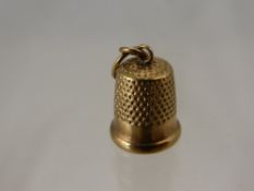 A Lady's 9 Ct Gold Pendant, taking the form of a thimble, Chester hallmark.