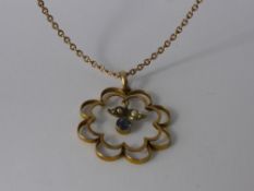 An Edwardian 9 Ct Gold Sapphire and Seed Pearl Floral Pendant, on 9 ct gold chain, sapp 3.5 mm,