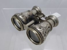 A Pair of Silver Cased Le Jockey Club Paris Binoculars, with chased silver mount, assayed Birmingham