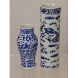 A Chinese Quing Dynasty Porcelain Cylindrical Blue and White Vase, depicting dragons face to face