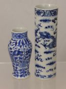 A Chinese Quing Dynasty Porcelain Cylindrical Blue and White Vase, depicting dragons face to face