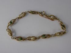 A 9 Ct Gold, Pearl and Turquoise Twist Link Bracelet, approx 7 gms.