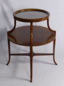 An Edwardian Mahogany Inlaid Tier Top Butlers Table, the circular table having inlay to sides and