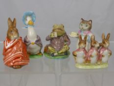 A Miscellaneous Collection of Beatrix Potter Figurines including Flopsy Mopsy and Cotton Tail,