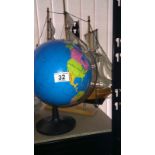 globe and ship