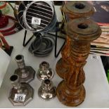 collection of candlesticks wood and metal