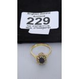 14 CARAT GOLD  LADY'S RING WITH BLACK STONE