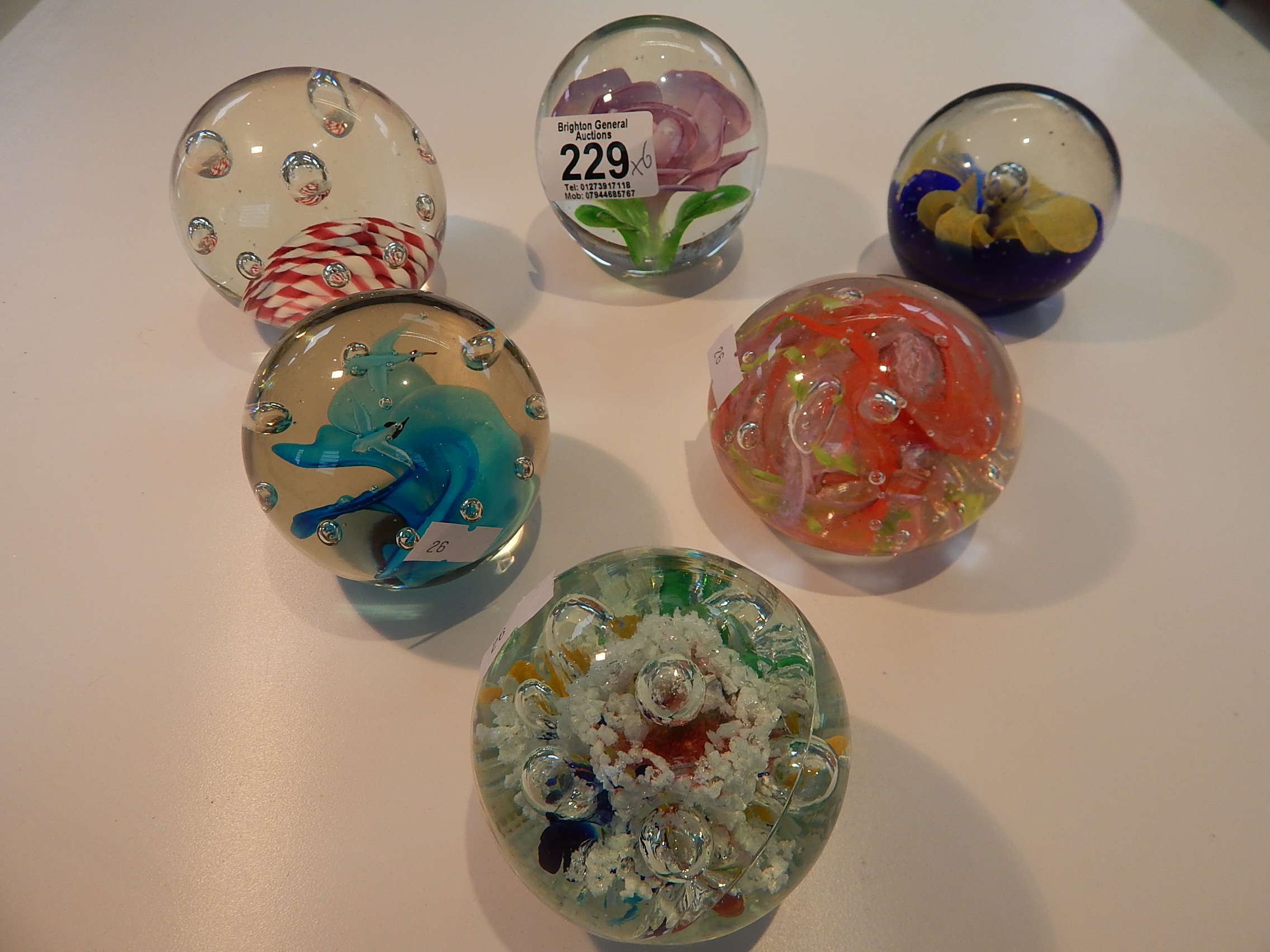 6 ASSORTED PAPERWEIGHTS
