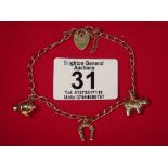 9CT  GOLD CHARM BRACELET WITH CHARMS 5.3 GRAMS