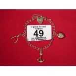 9CT GOLD CHARM BRACELET WITH CHARMS 4.5 GRAMS