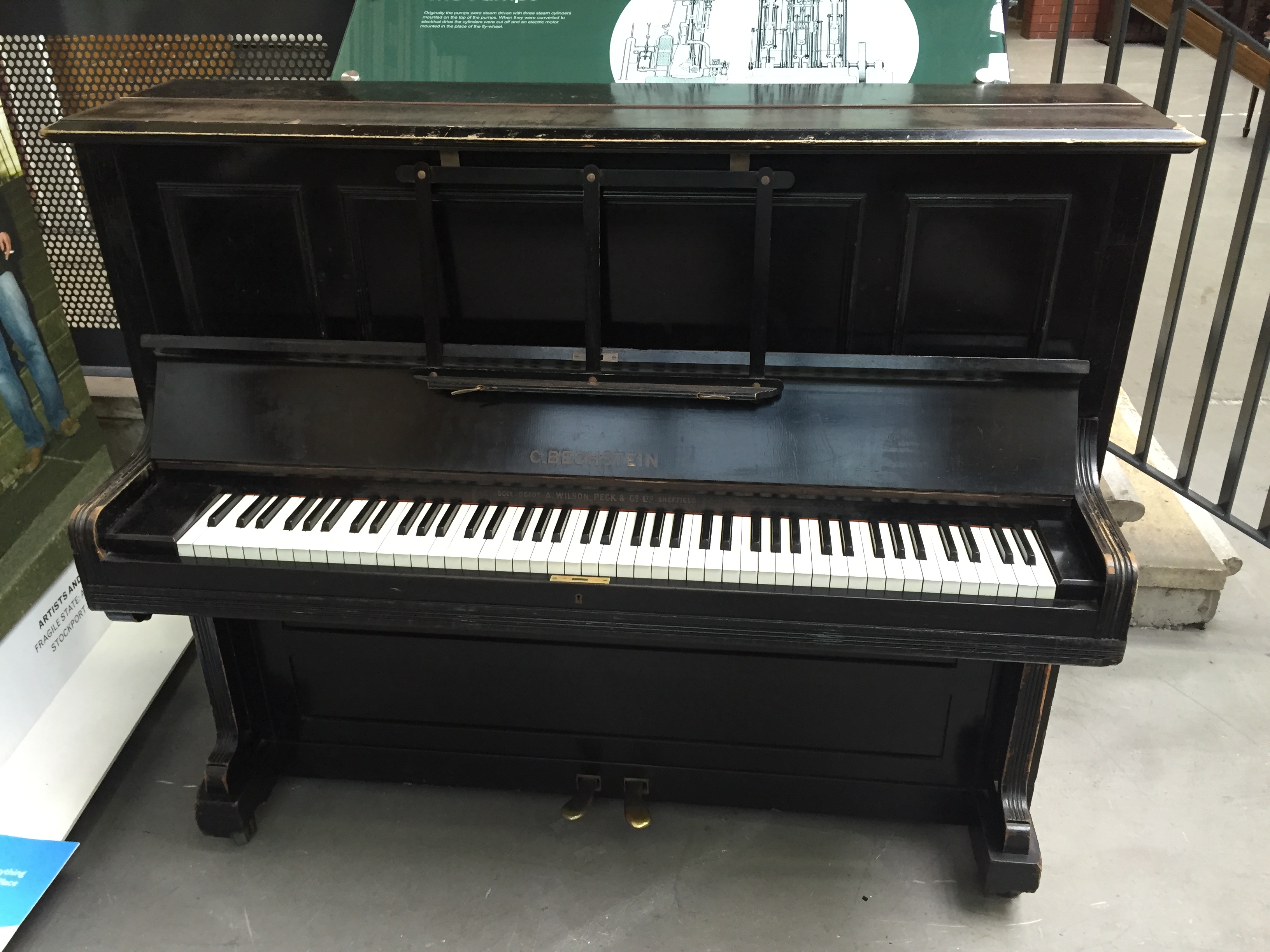 Bechstein C.1902 An upright piano in an ebonised case.