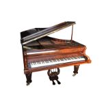 Broadwood C.1865 An 8ft 6 concert grand piano in a rosewood case with a traditional style music desk