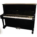 Yamaha     C.1971 A Model U3 upright piano in a black polyester case.