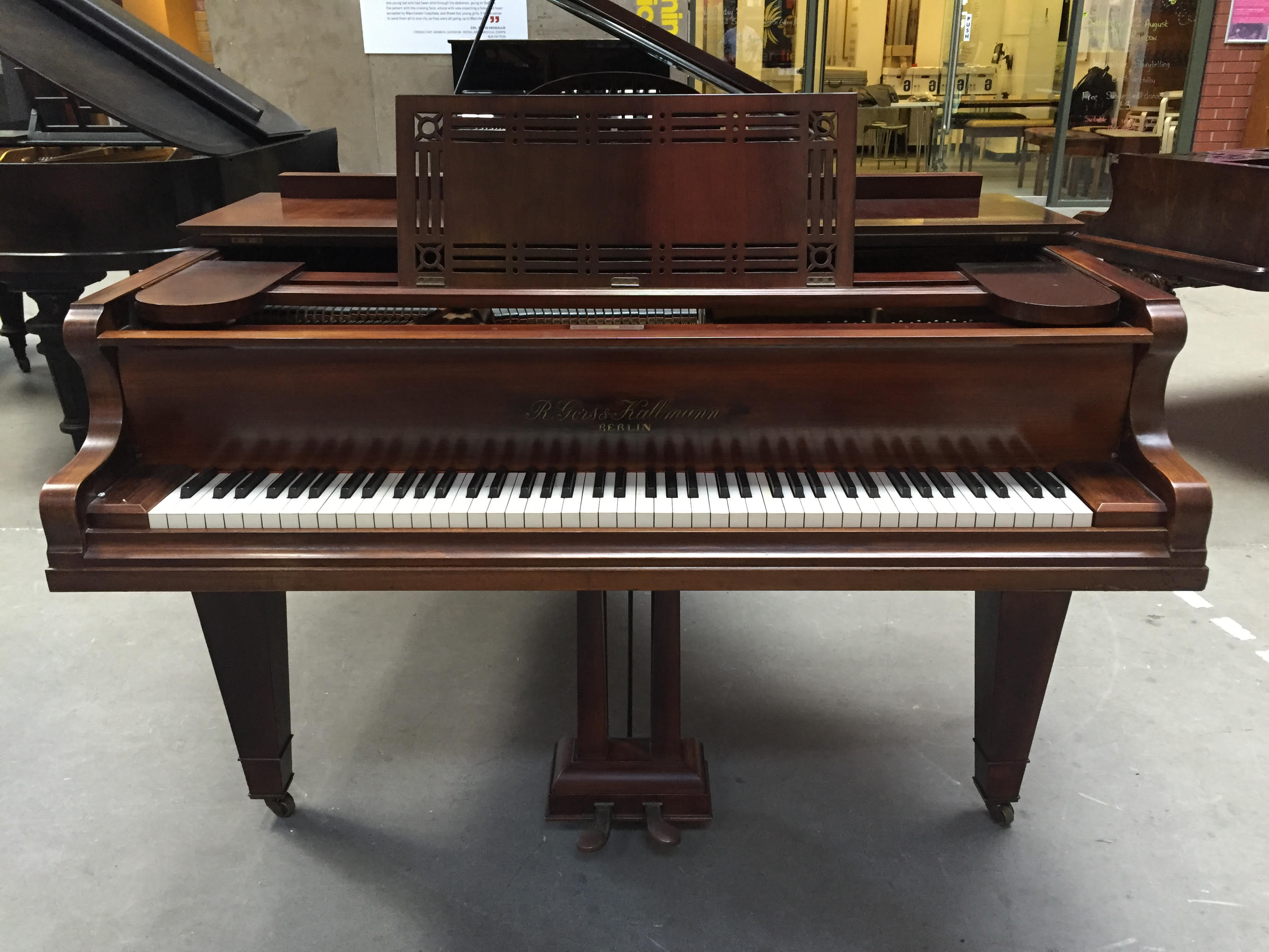 Gors & Kallmann C.1909 A 5ft 6 grand piano in a polished mahogany case raised on square tapered