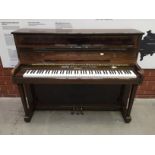 Knight C. 1997 A Model London upright piano in a walnut polyester case.