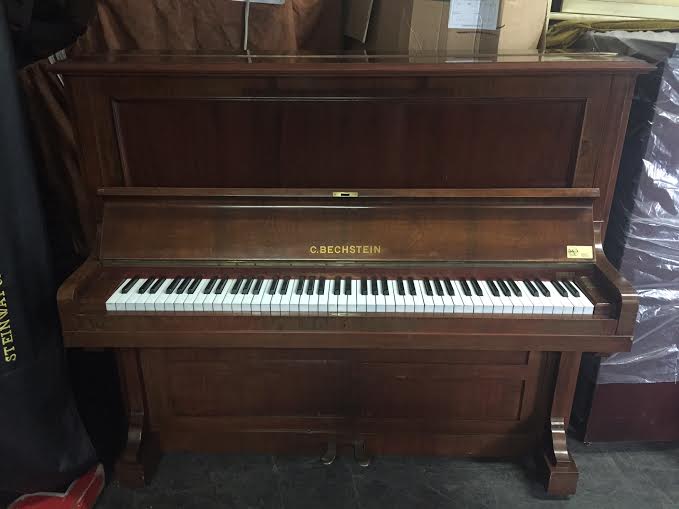 Bechstein    C.1899 A Model 10 upright piano in a rosewood case.
