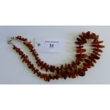 An amber chunky bead necklace with paste set magnetic ball clasp fitting