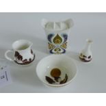 A collection of Highland fine bone china to include a jar and cover, miniature vase and basin and