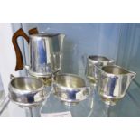 Picquot Ware to include a coffee pot, two cream jugs and two sugar bowls (5)