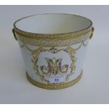 19th century Continental white glazed and gilt rimmed cache pot with gilt ring handles to sides