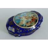 Continental porcelain casket of oval form, the hinged lid with central Classical Renaissance style