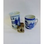 A Chinese blue and white tankard, painted with a Pagoda and river landscape scene, together with a