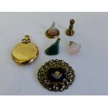Gold plated Waltham pocket watch, black enamel and yellow metal mourning brooch, hardstone seal,