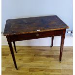 A 19th century side table having a pine top over mahogany frame with freize drawer raised on squared