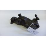 Doris Lindsey bronzed resin model of a dachshund lying on its back, 29cm long