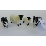 Two Beswick Collie Sheepdog figures together with a Beswick Ram and a black faced lamb (4)