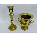 Large brass candlestick and a brass campana twin handled urn vase (2) tallest 38cm high