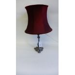 A silver plated table lamp and shade