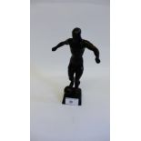 Bronze patinated figure of 'The Footballer', 20cm high