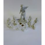 A collection of white glazed cherubs to include four Capo di Monte, one Dresden and a pair of