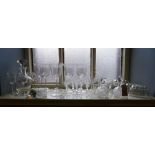 A quantity of crystal and glassware to include various drinking glasses, decanters, scent bottles